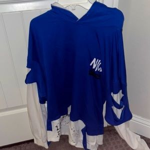 Blue and white street design hoodie. Good condition hoodie that fits long